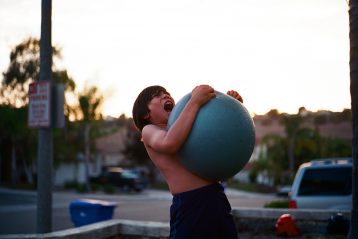 boy holding ball