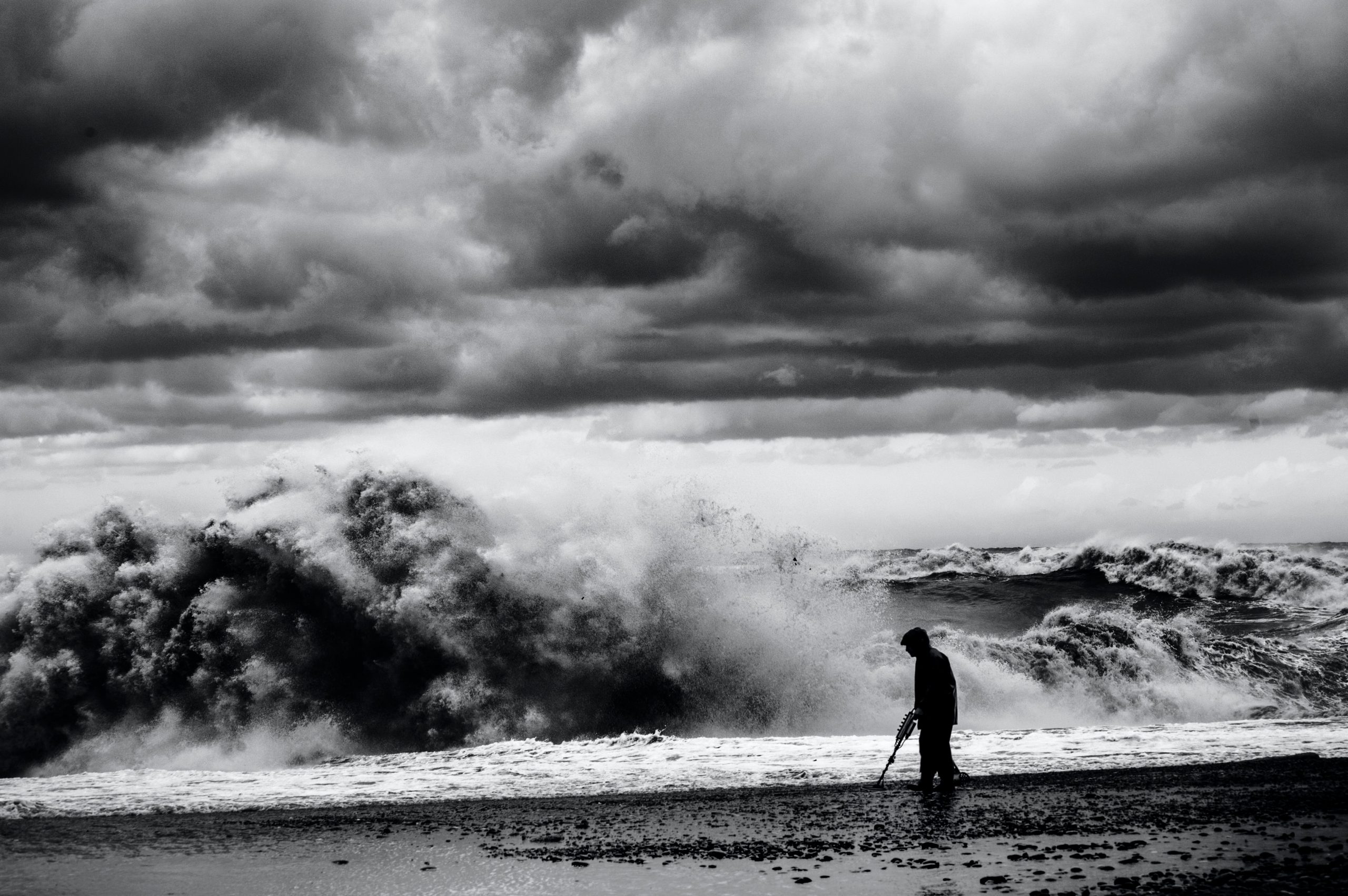 black and white photo of a storm at sea