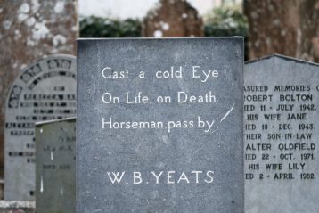 W.B. Yeats tombstone beside tombstones