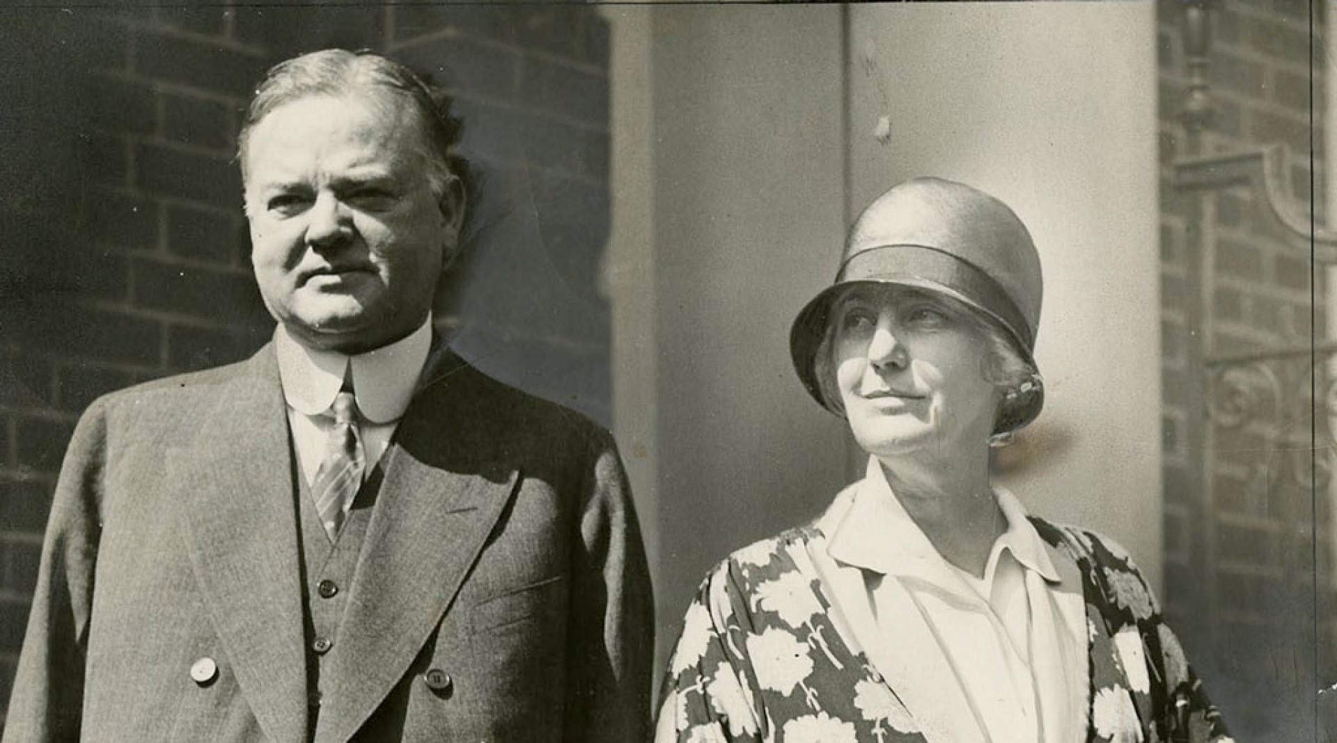 A black and white photo of Herbert and Lou Hoover