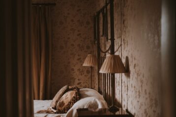 bedroom with two lamps and bed