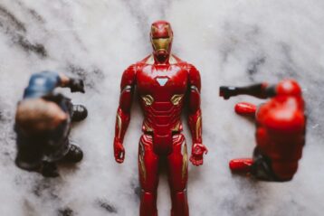red and black iron man action figure