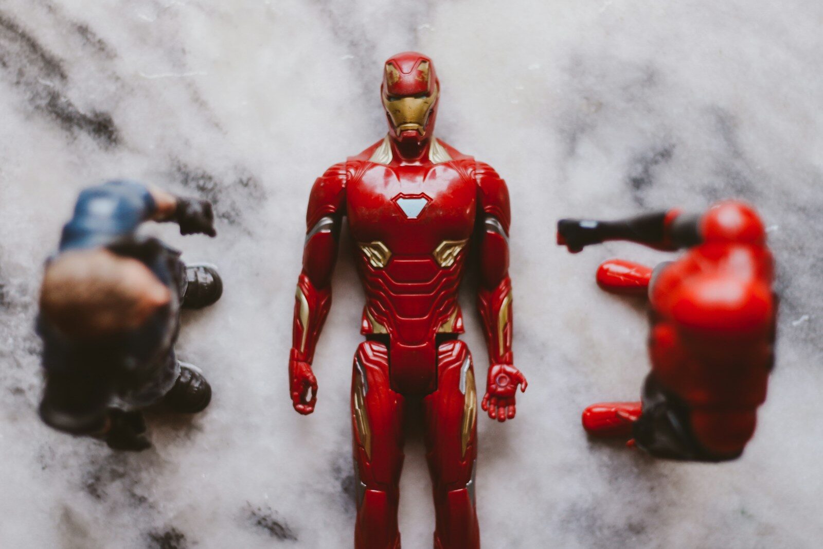 red and black iron man action figure